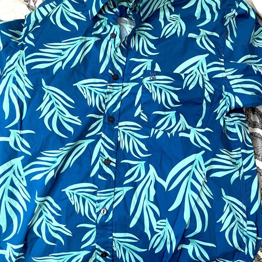 Men bottom down t shirt by puerto rico designer “nono Maldonado”